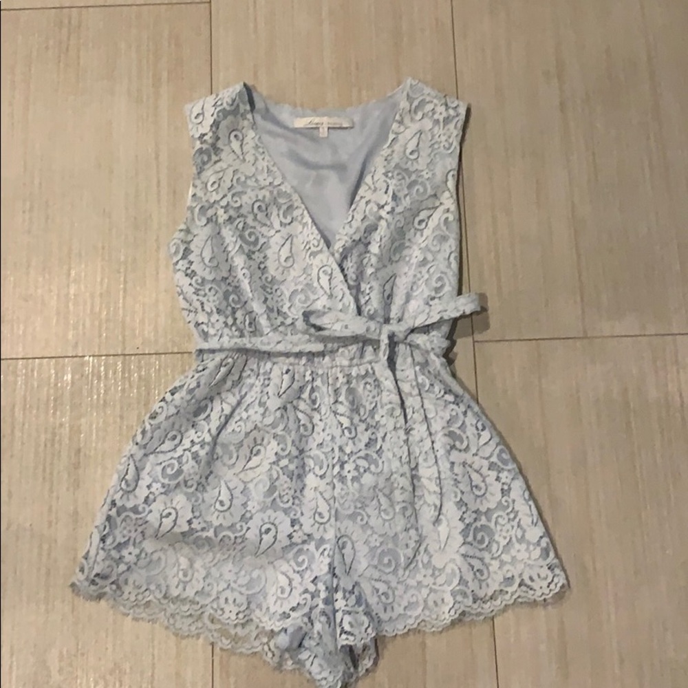 Lovers+Friends blue lace romper with waist tie